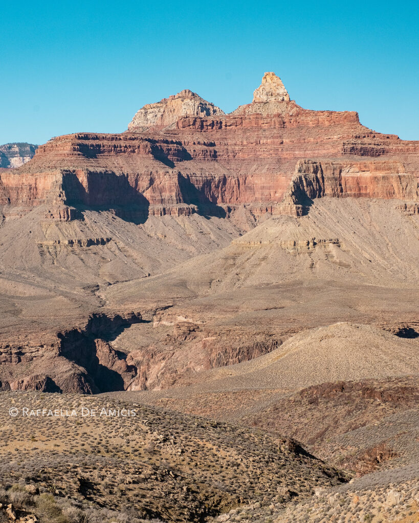 majesty of the grand canyon with cloudless blue sky