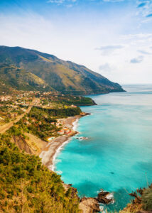 Aerial view of Acquafredda with cliffs dropping to blue water, on the west coast of Italy in Basilicata