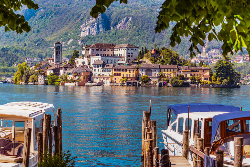 boats overlooking san giulio island on Lake Orta in northern Italy