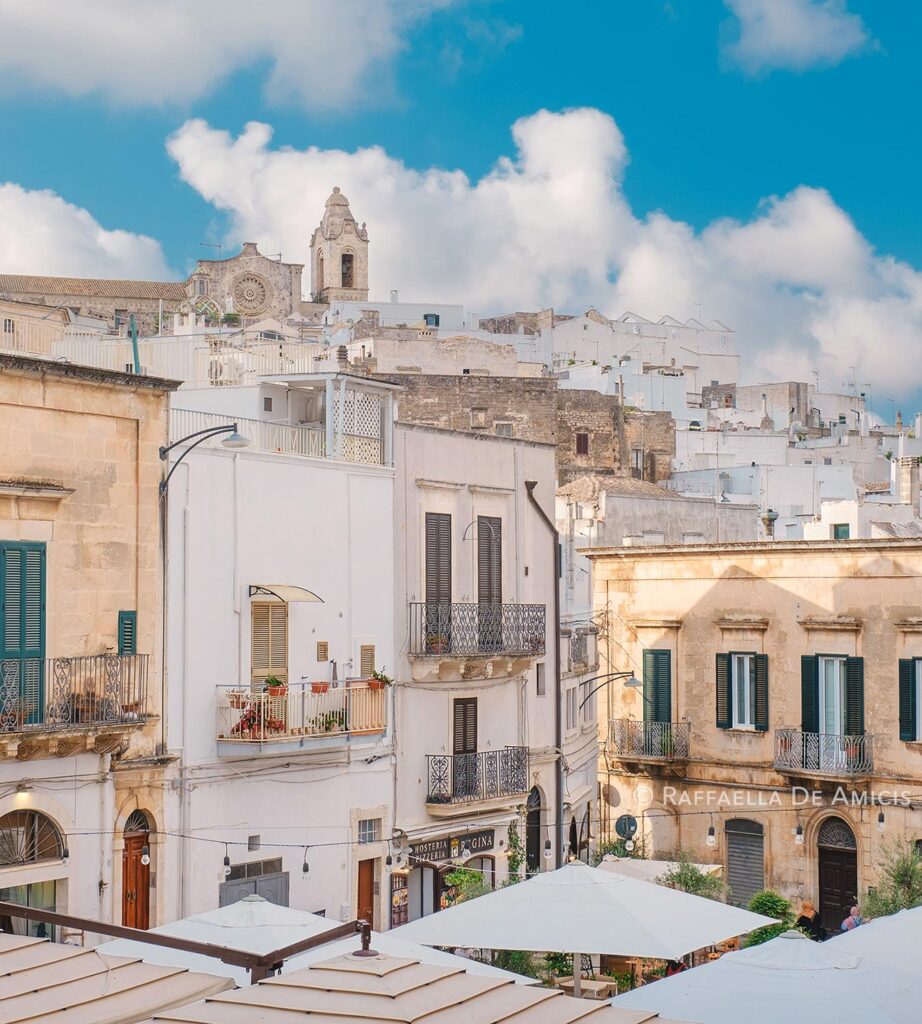 ostuni's iconic white buildings viewed from the lower city center