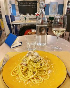 plate of pasta carbonara in Rome restaurant called Meridionale